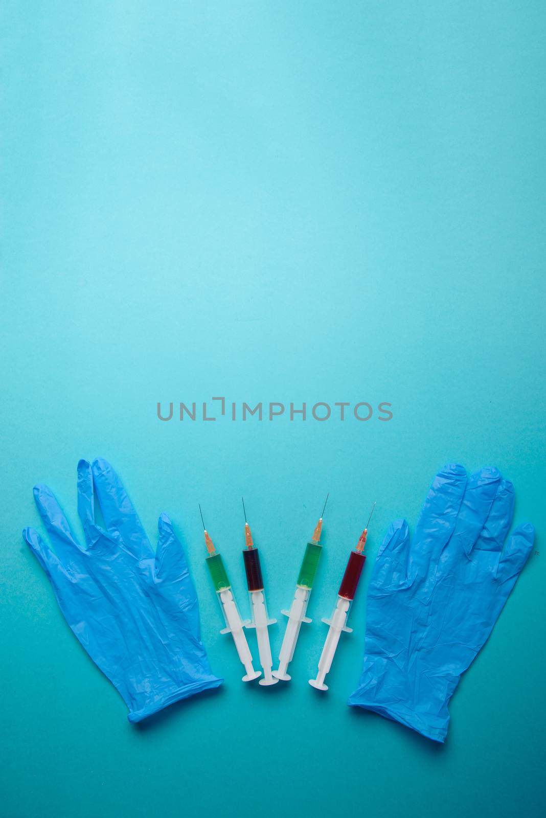 syringe on blue background. Injections. Food adittive