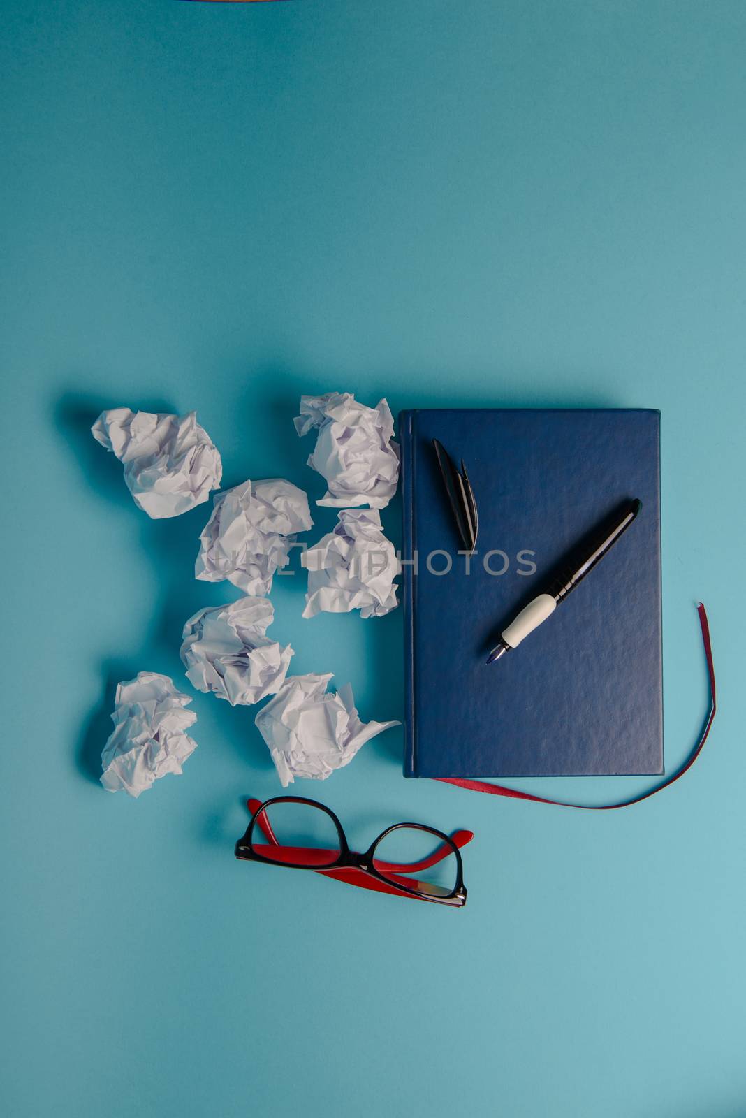 Desk with Tools and Notebook office desk on blue background