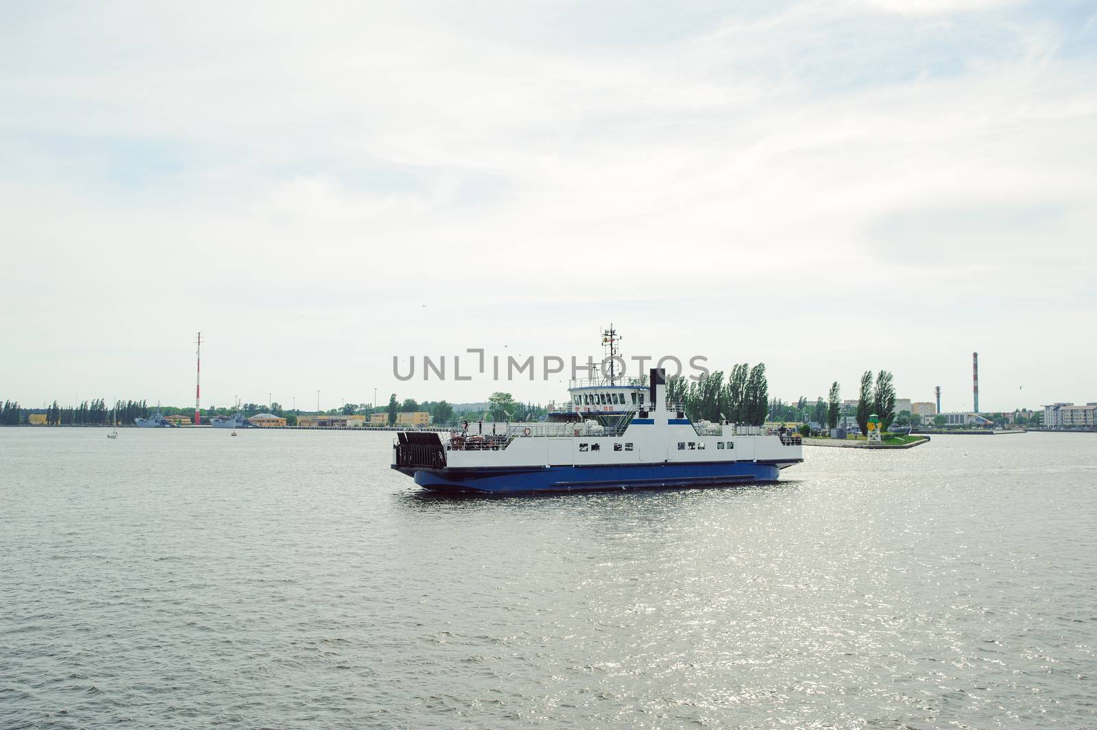 cruise ferry ship sailing in still water
