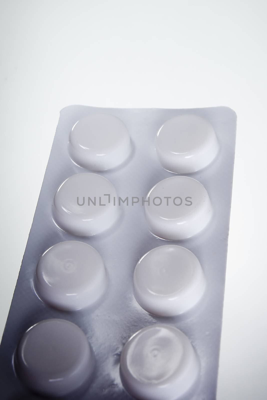 Blister with pills on a white background