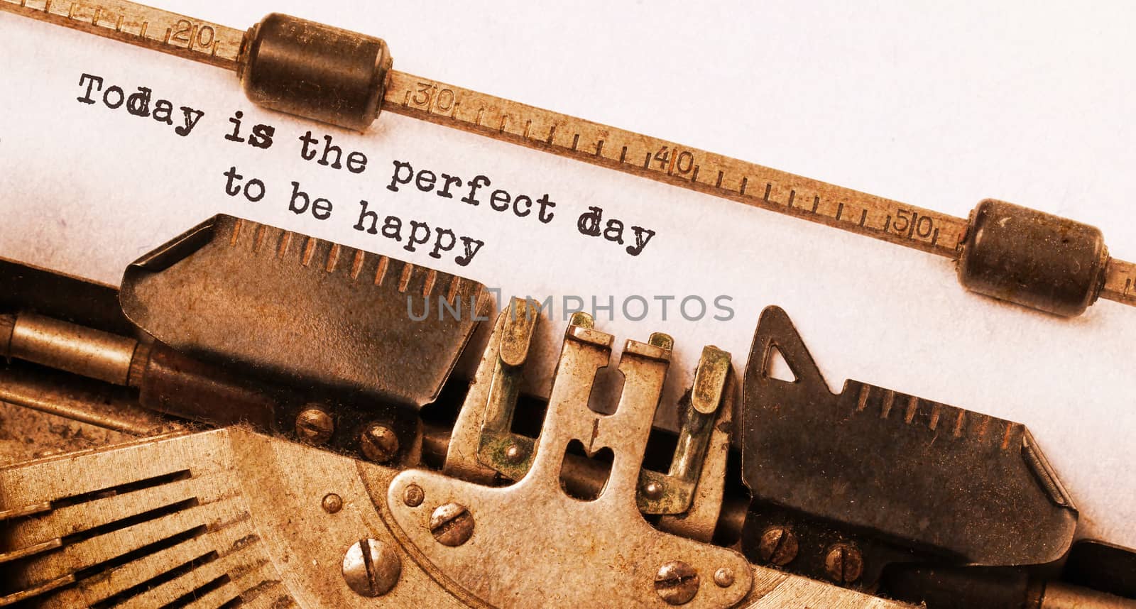 Today is the perfect day to be happy, written on an old typewriter, vintage