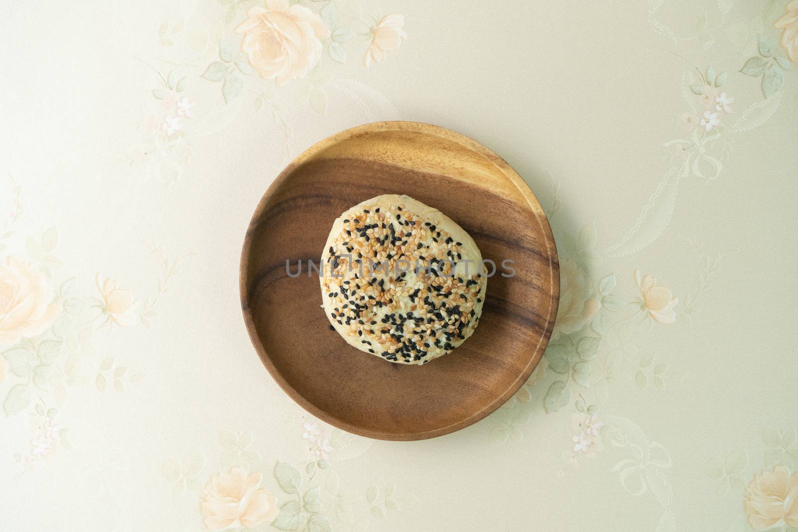 Chinese moon cake or pastry with sesame on top.