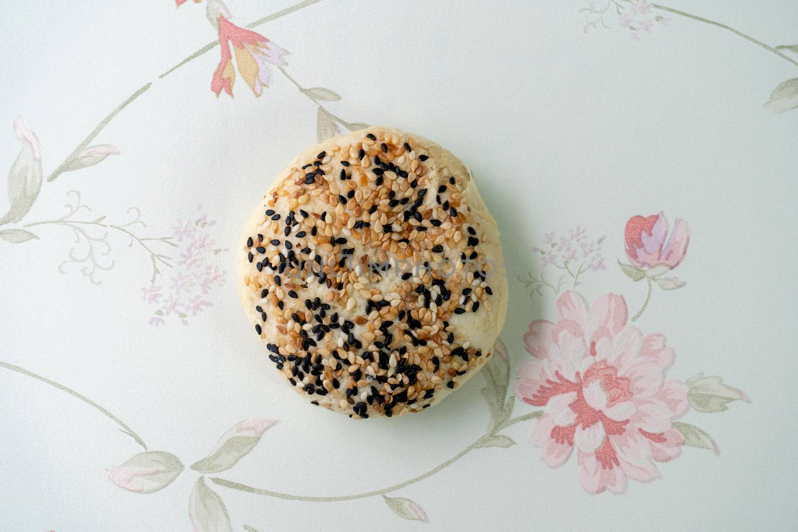 Chinese moon cake or pastry with sesame on top.