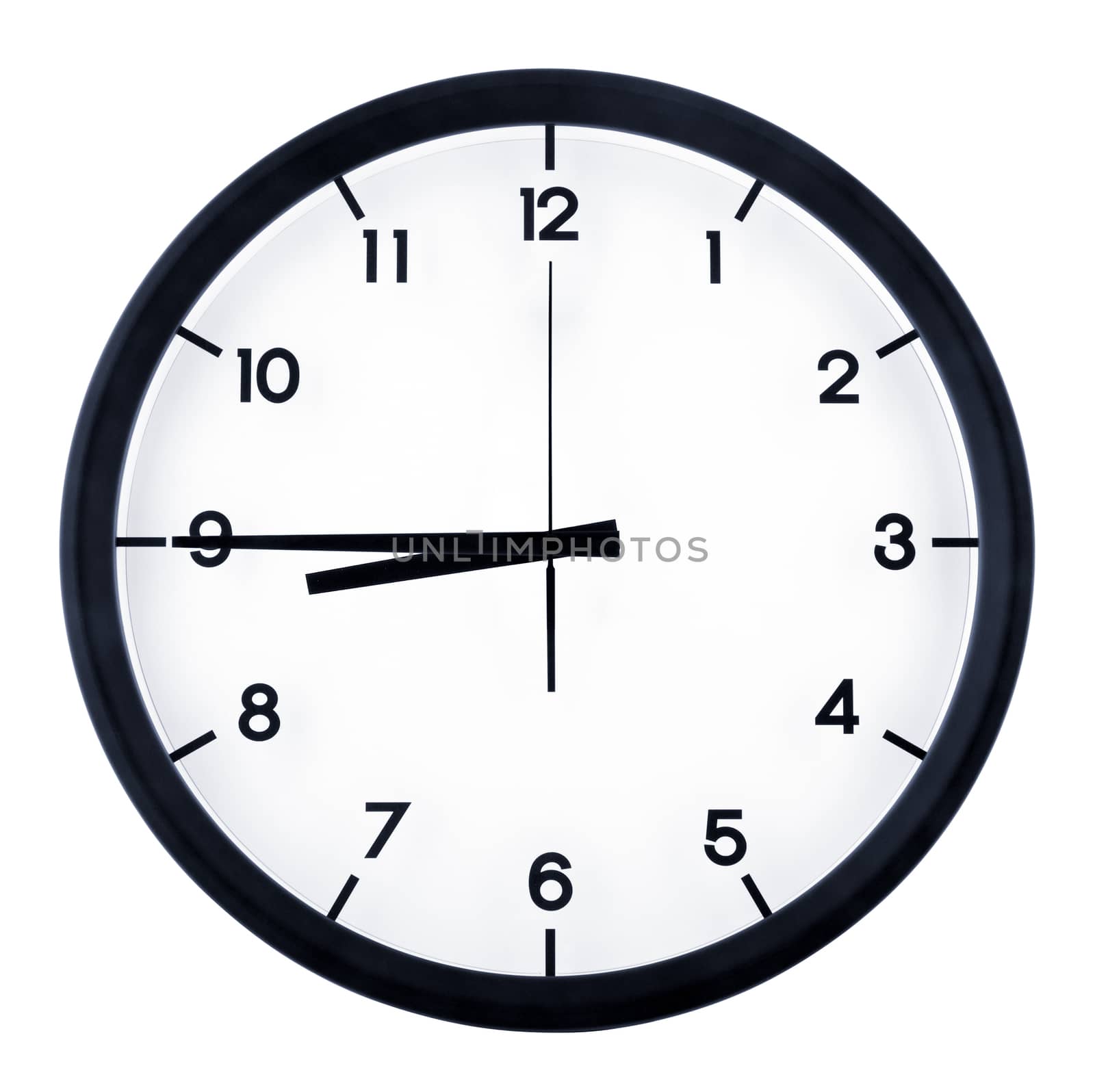 Classic analog clock pointing at eight forty five o'clock, isolated on white background.