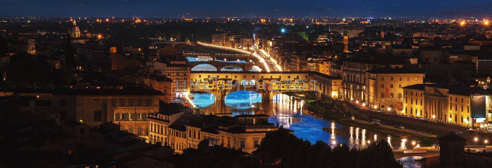 Night over Ponte Vecchio on river Arno in Florence, Italy