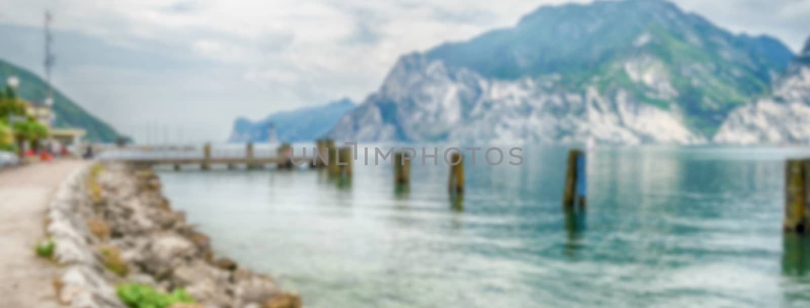 Defocused background over the Lake Garda from the town of Torbole, Italy. Intentionally blurred post production for bokeh effect