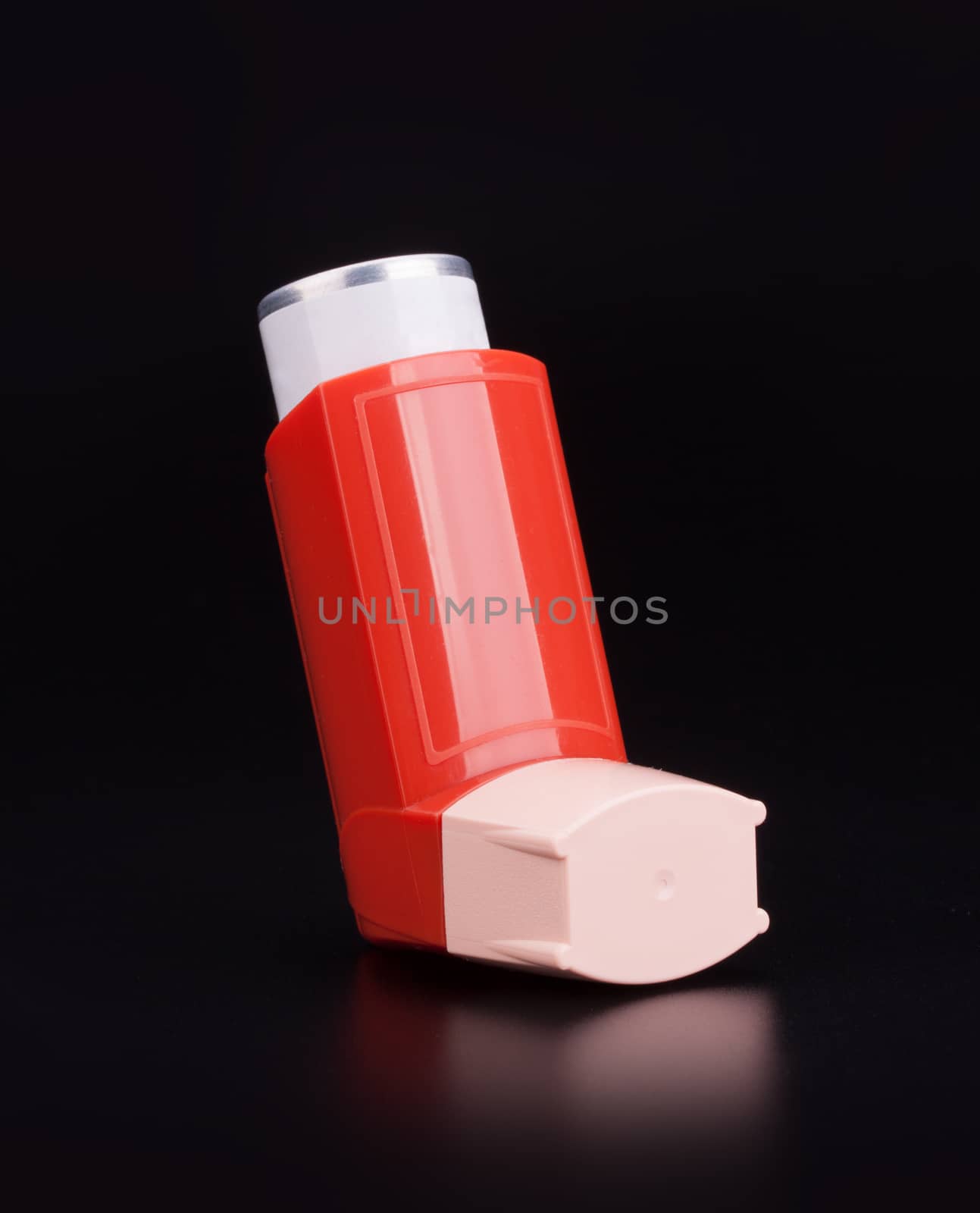 Bronchitis asthma inhaler on black background