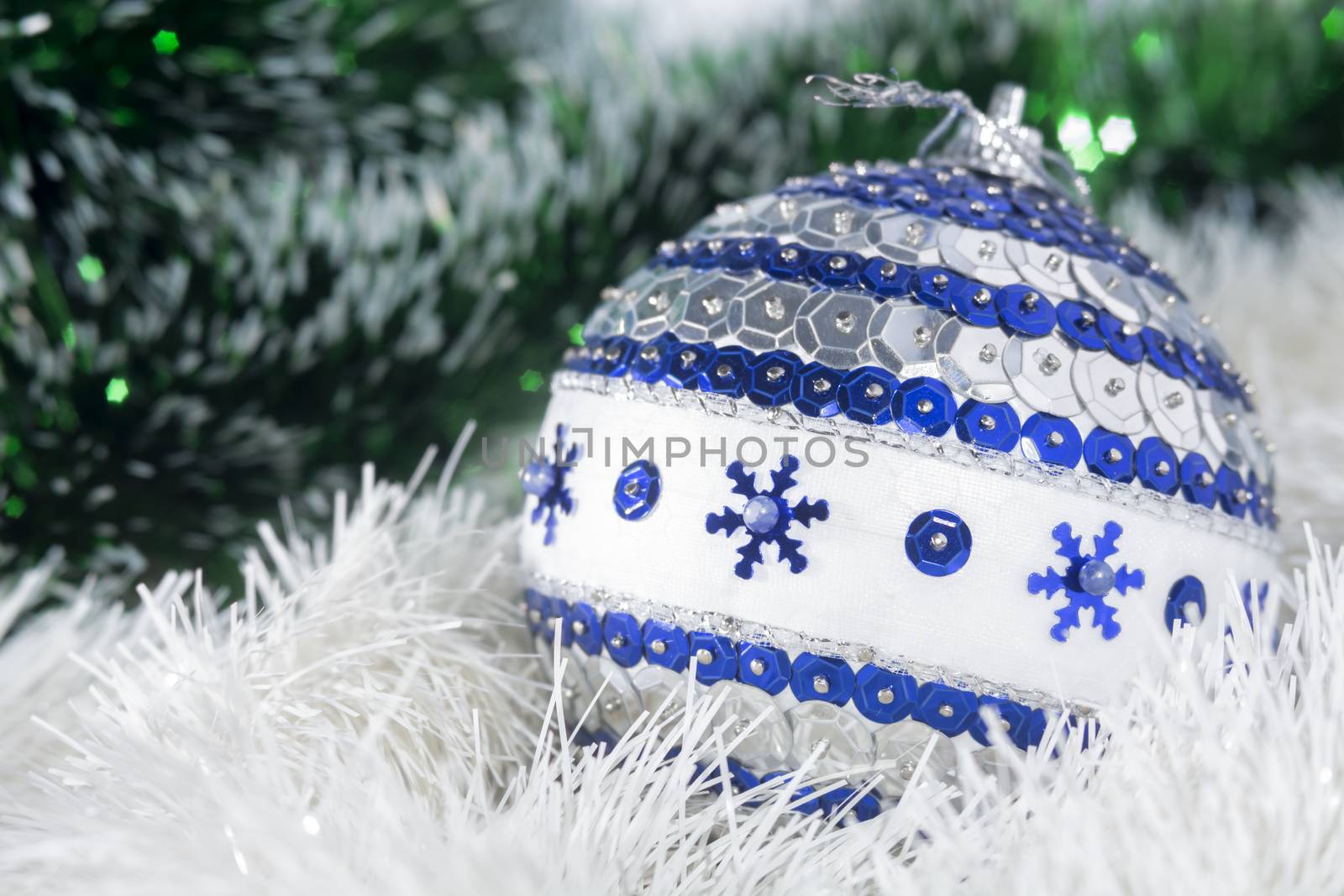 Picture of Christmas decorations on the Christmas tree. Picture perfect for a Christmas card or background.