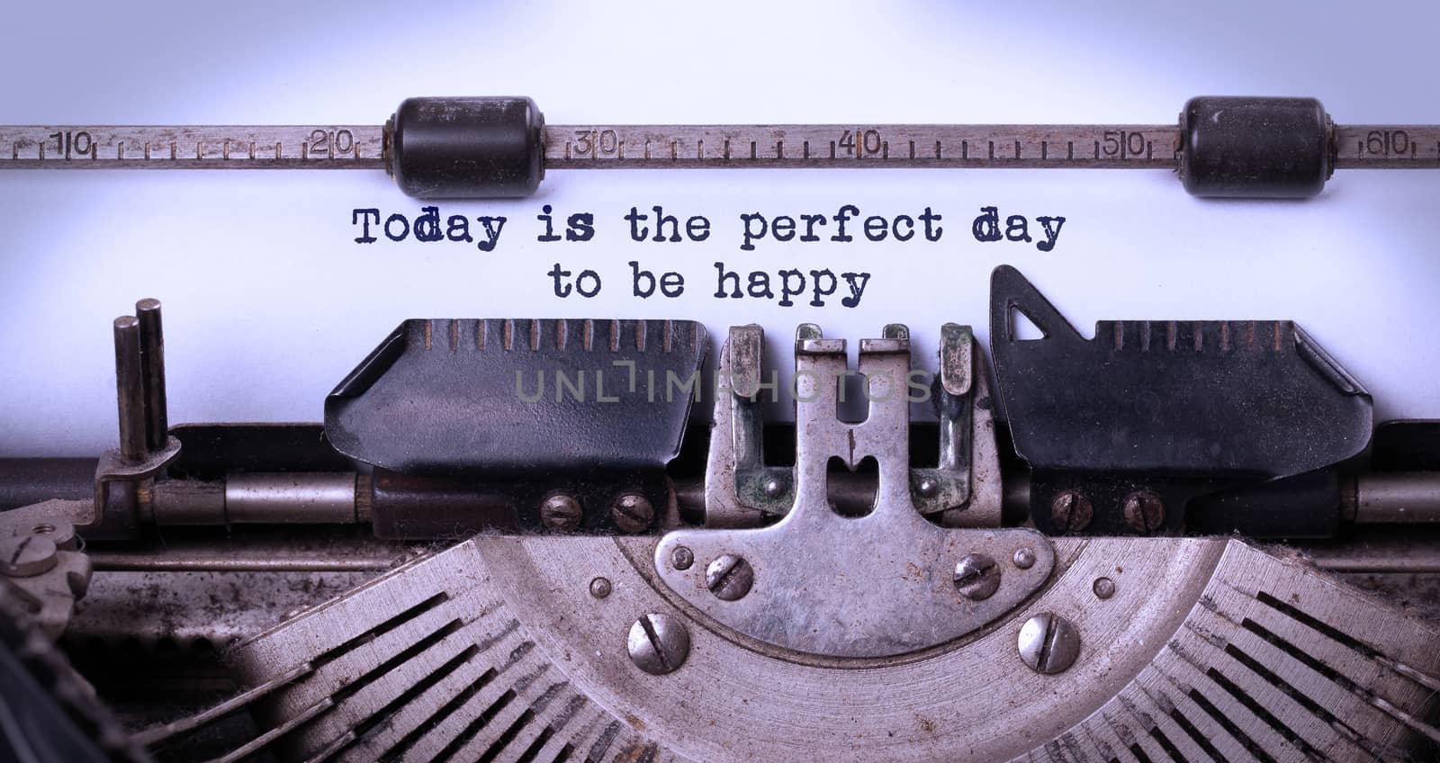 Today is the perfect day to be happy, written on an old typewrit by michaklootwijk