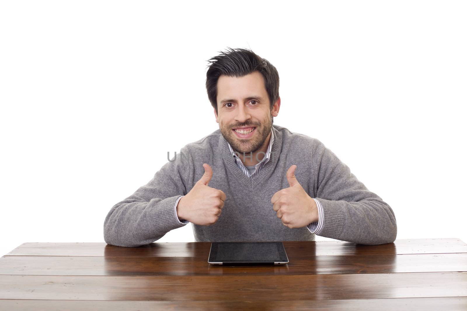 happy man on a desk with a tablet pc, isolated