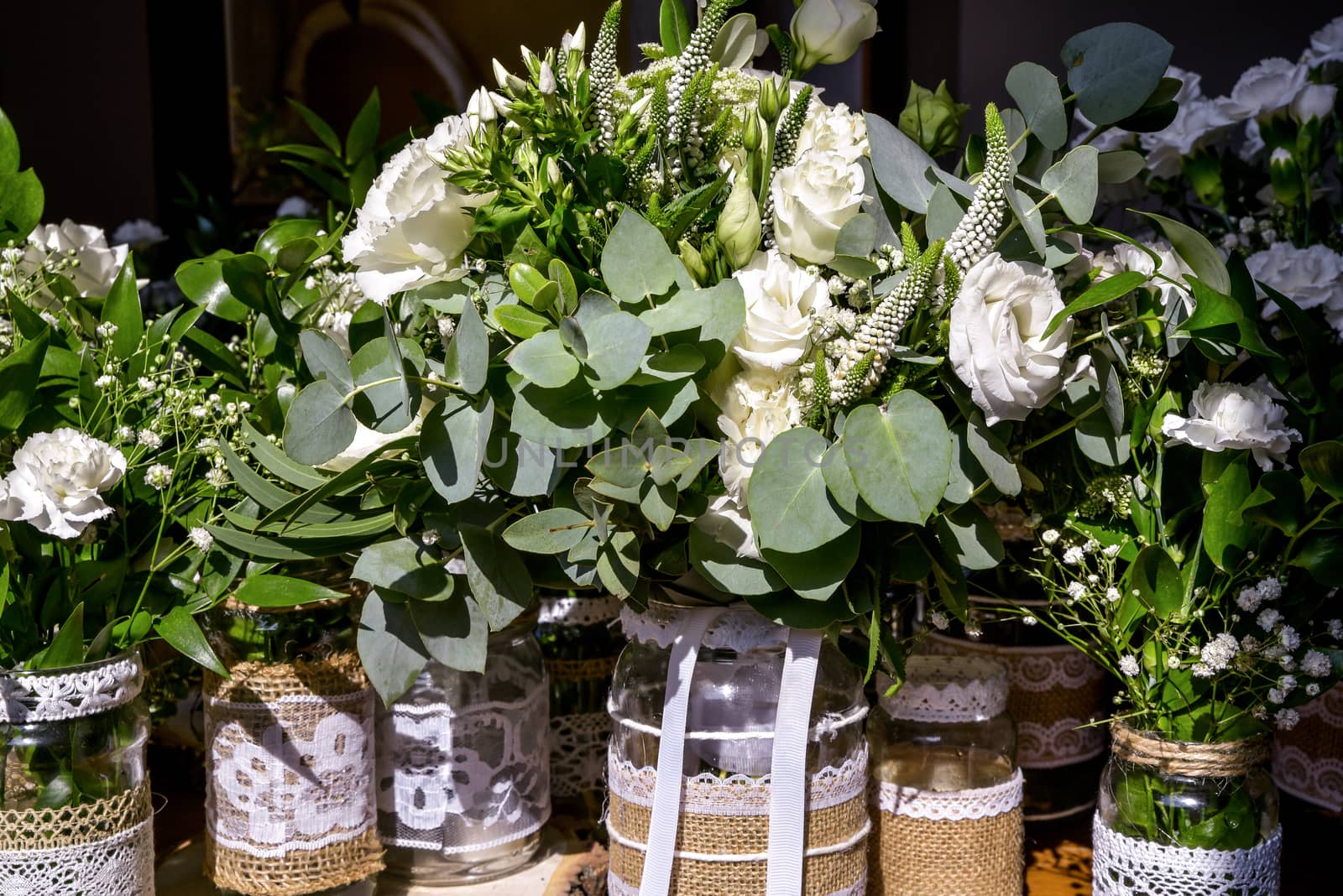 Wedding table set for fine dining or other catered event, center-piece