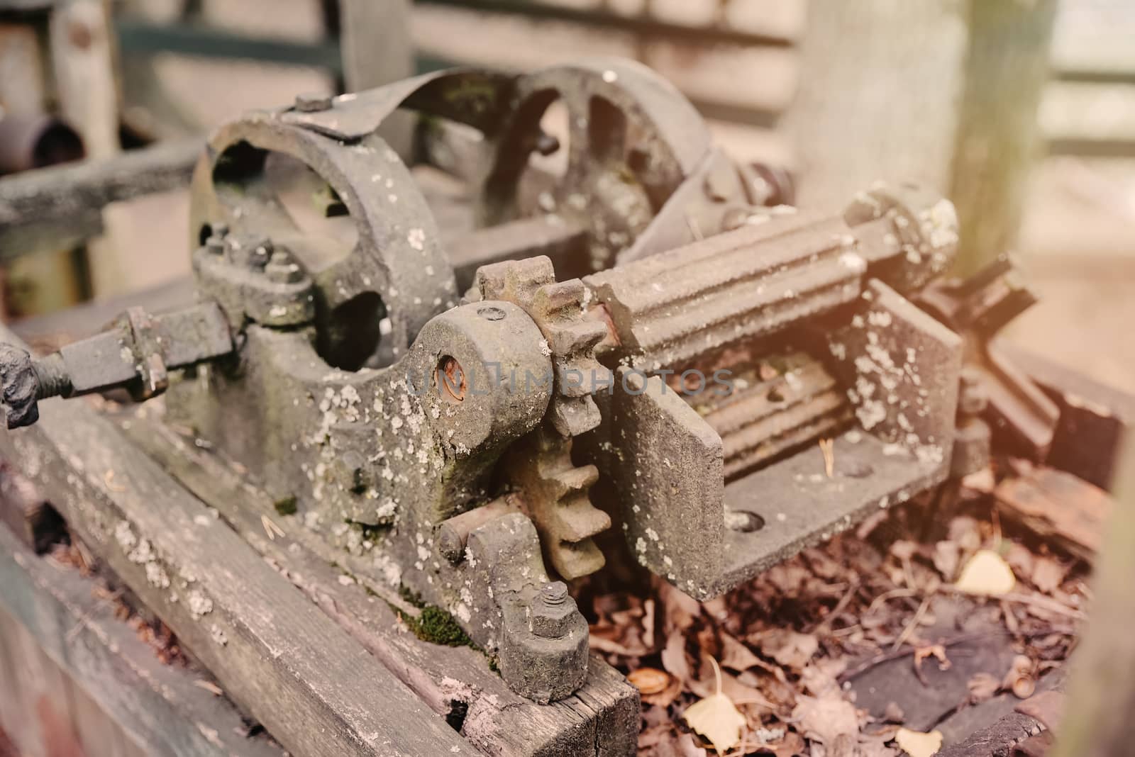 abandoned rusty old farm machinery in garden