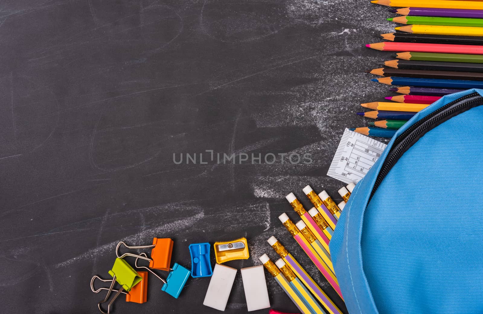 Back to school shopping backpack, Accessories in student blue bag on blackboard background