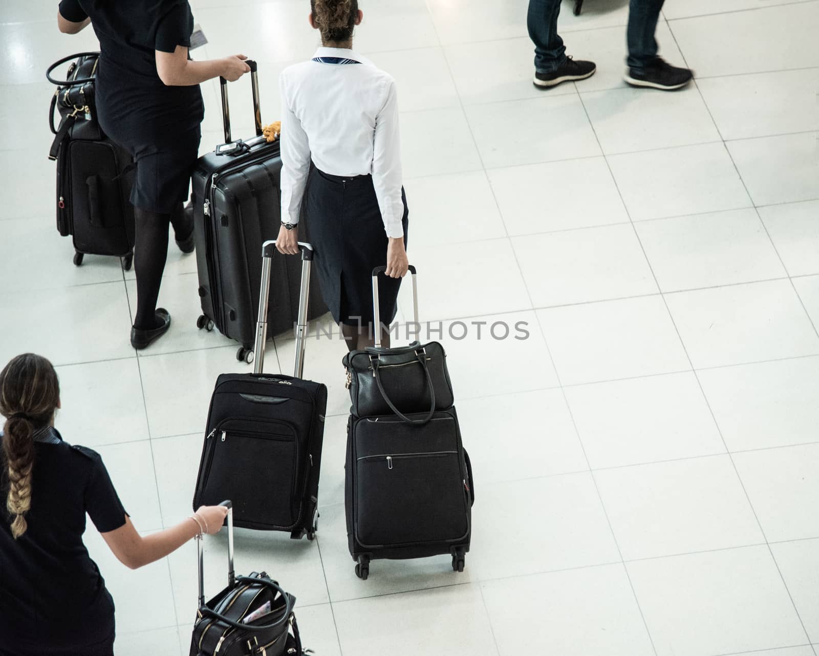 People traveling luggage bag he walking in air port terminal building