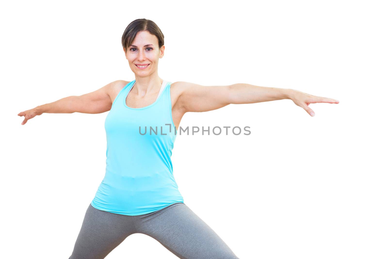 Young attractive woman practicing yoga on white isolated background by HERRAEZ