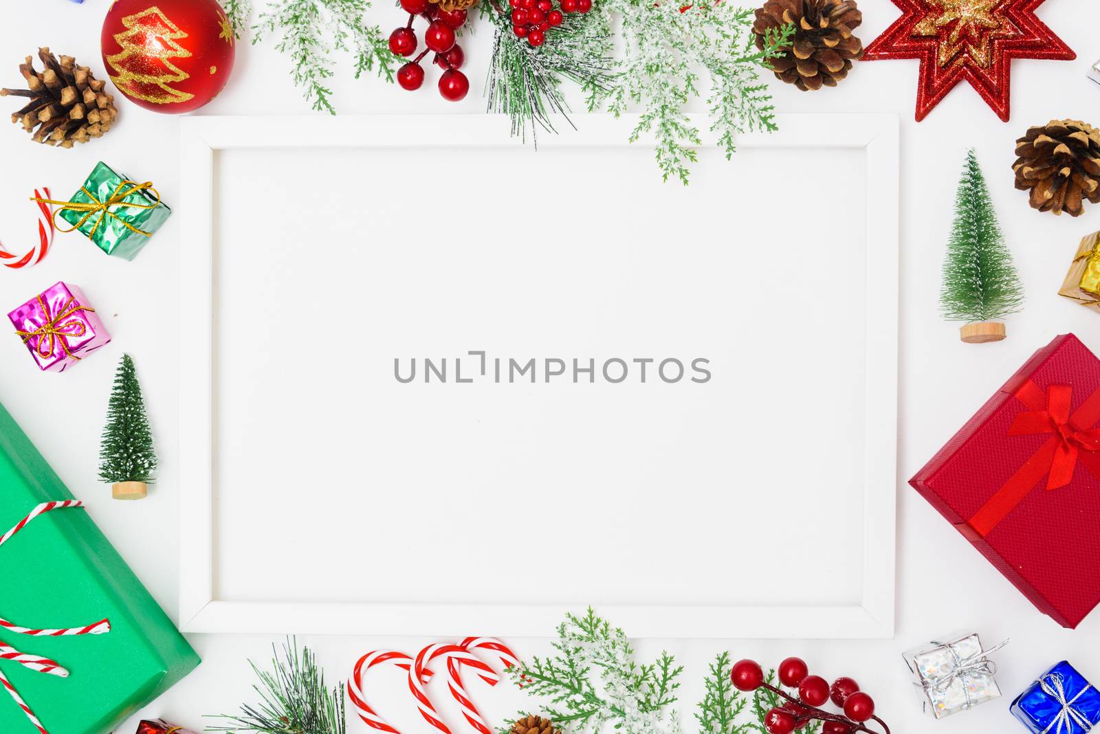 Christmas composition decorations, fir tree branches with Photo square frame on white background. Merry Christmas concept. Copy space for text