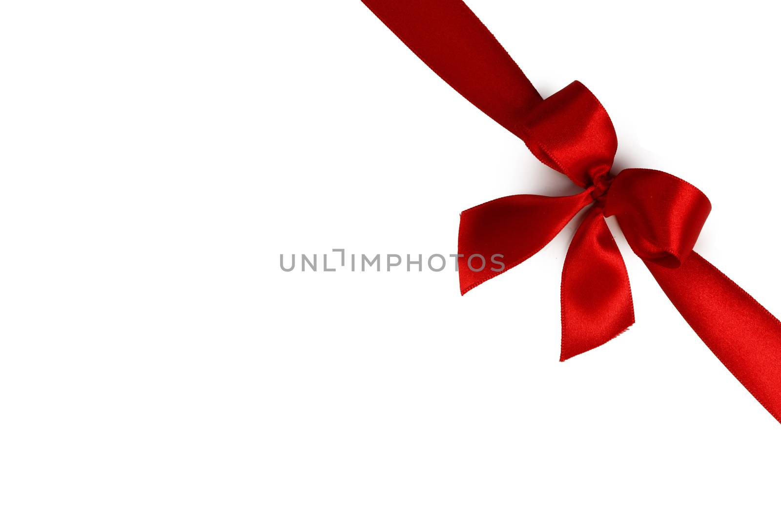 Elegant satin red ribbon bow isolated on white background