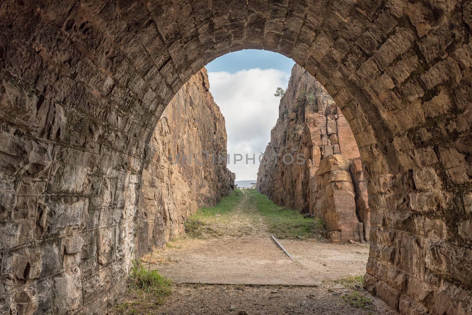 Western exit of the historic railroad tunnel at Waterval Boven by dpreezg