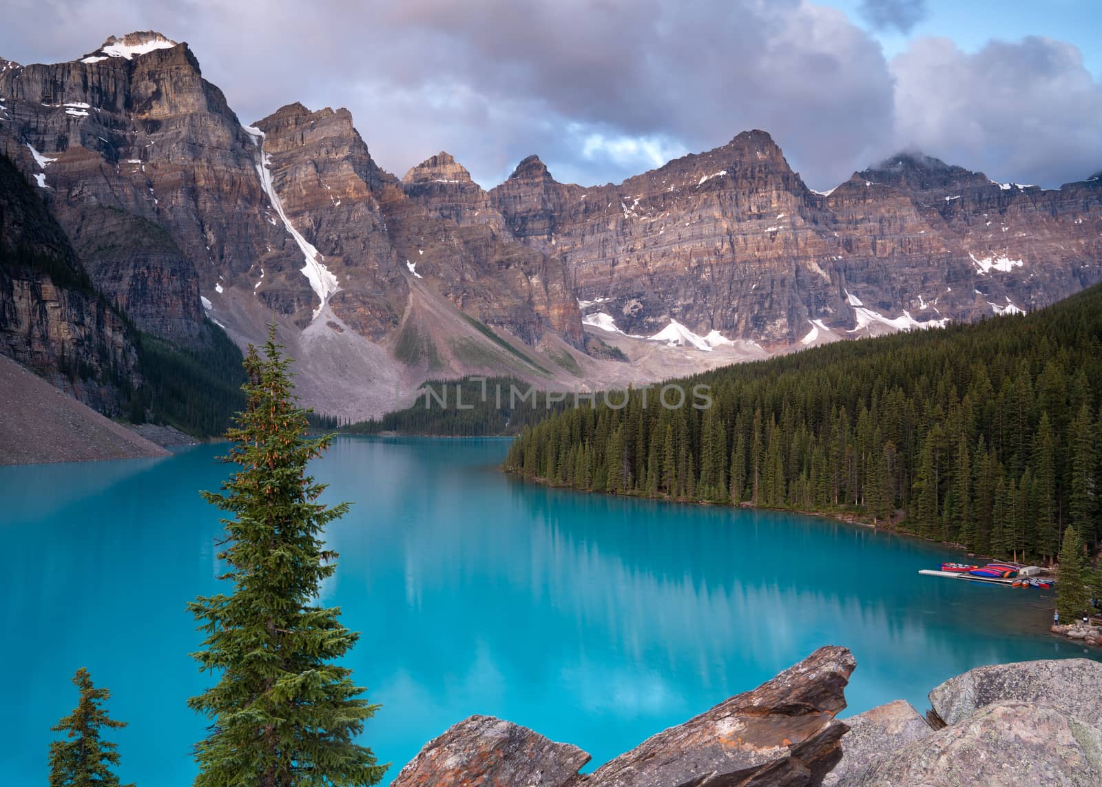 Panoramic image of the Moraine Lake at daybreak, Banff National Park, Alberta, Canada
