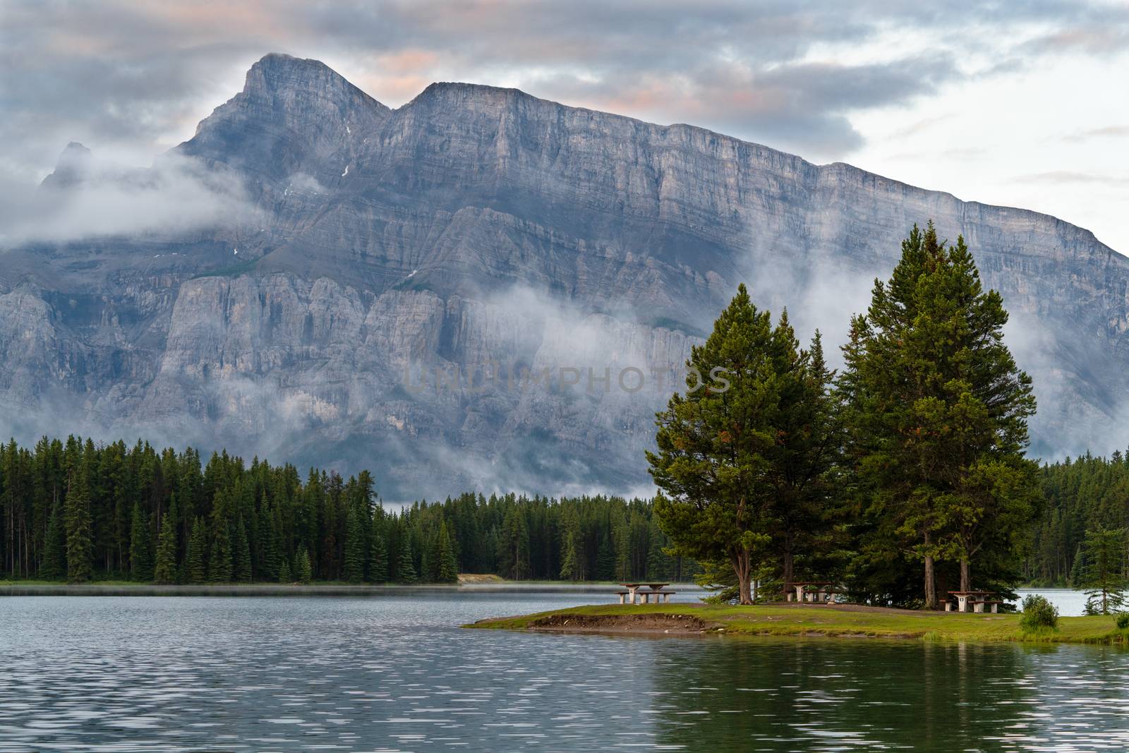 Panoramic image of Mount Rundle and Two Jack Lake with early morning mood, Banff National Park, Alberta, Canada
