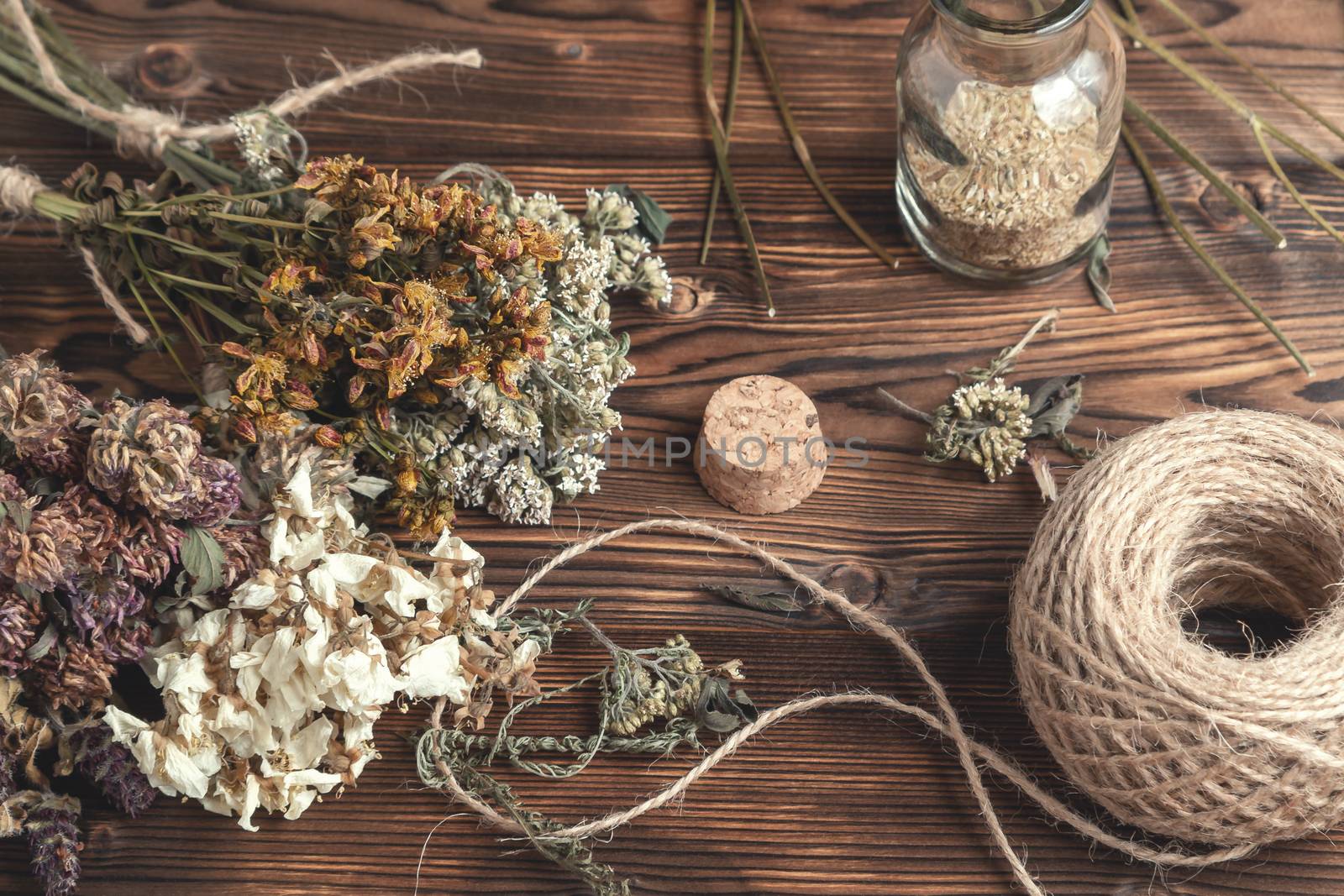 Drying and harvesting of medicinal herbs, homeopathy and alternative medicine concept.