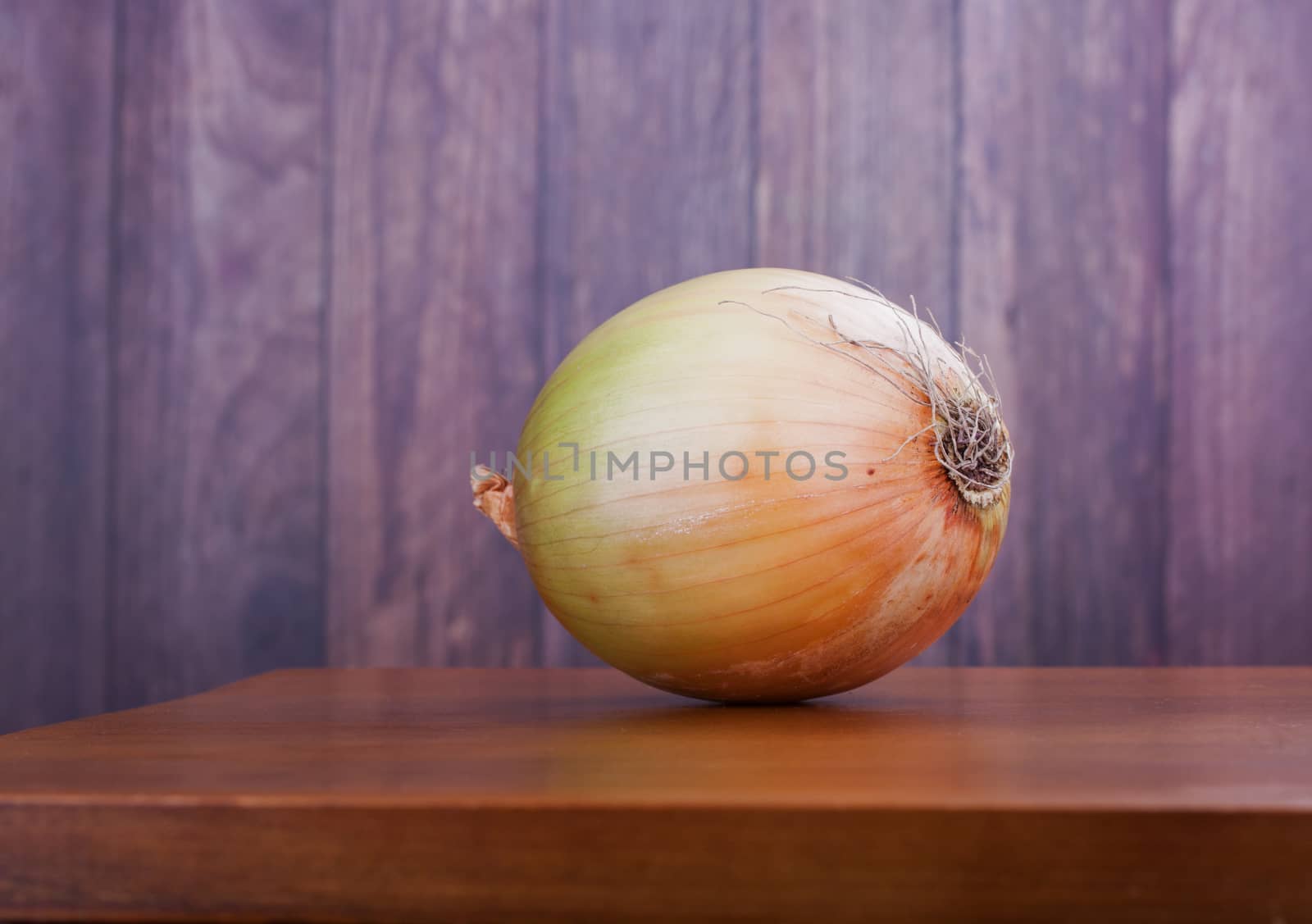 Closeup on whole onion by lanalanglois