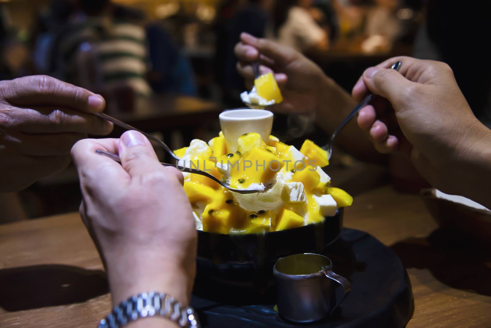 People eating bingsu sweet dessert - people with Korean style sweet dessert for background use by pairhandmade