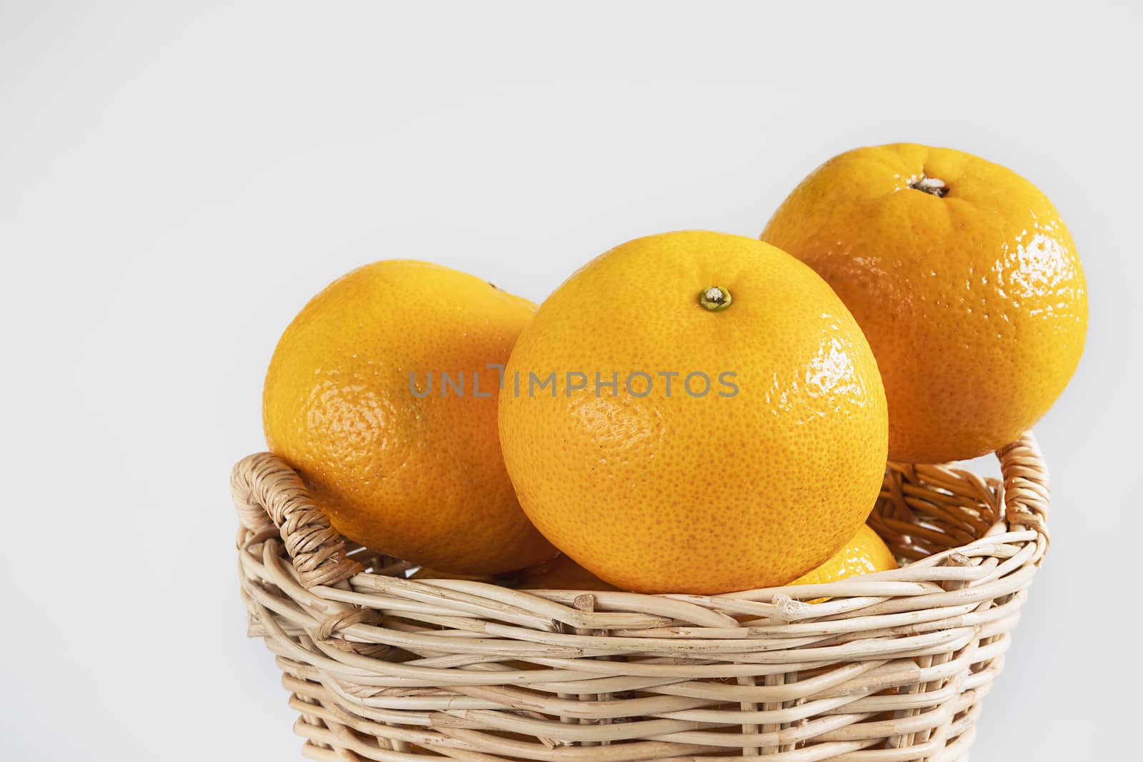 Fresh juicy orange fruit set over white background - tropical orange fruit for background use by pairhandmade