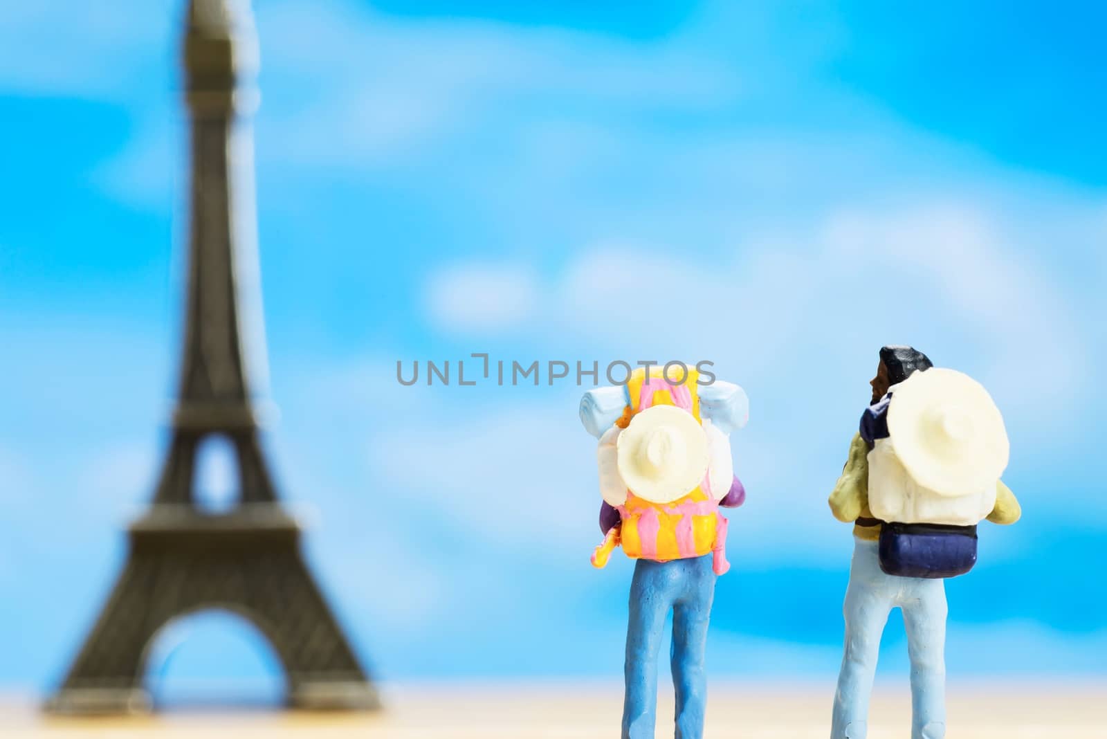 Small traveller figure for World Tourism Day background - September 27, UNWTO World Tourism Day celebration concept by pairhandmade