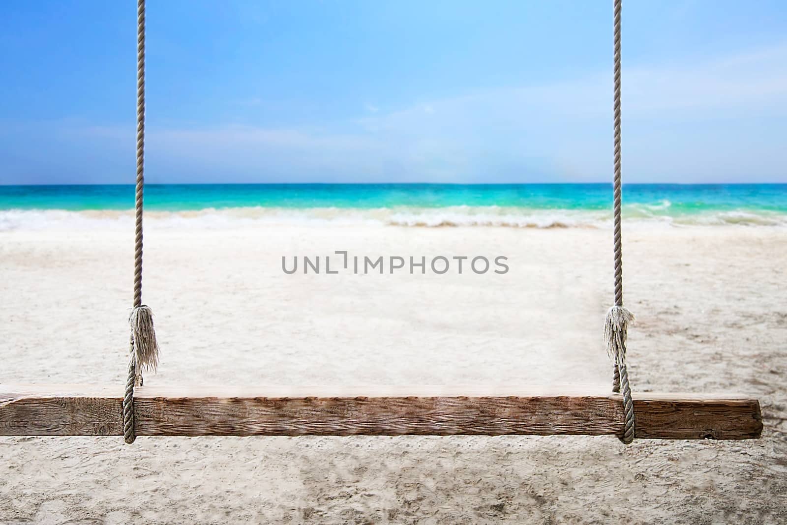 Relax beach swing on clean sea sand sun beach with blue clear sky landscape - sea nature background relax holiday concept by pairhandmade