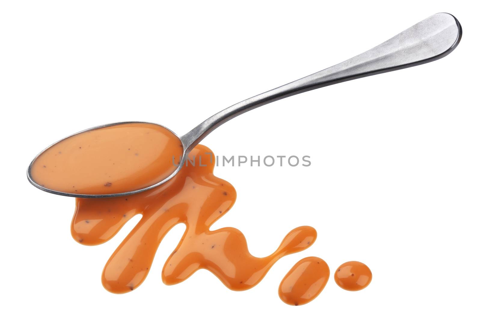 Cocktail sauce with spoon isolated on white background with clipping path, shrimp sauce