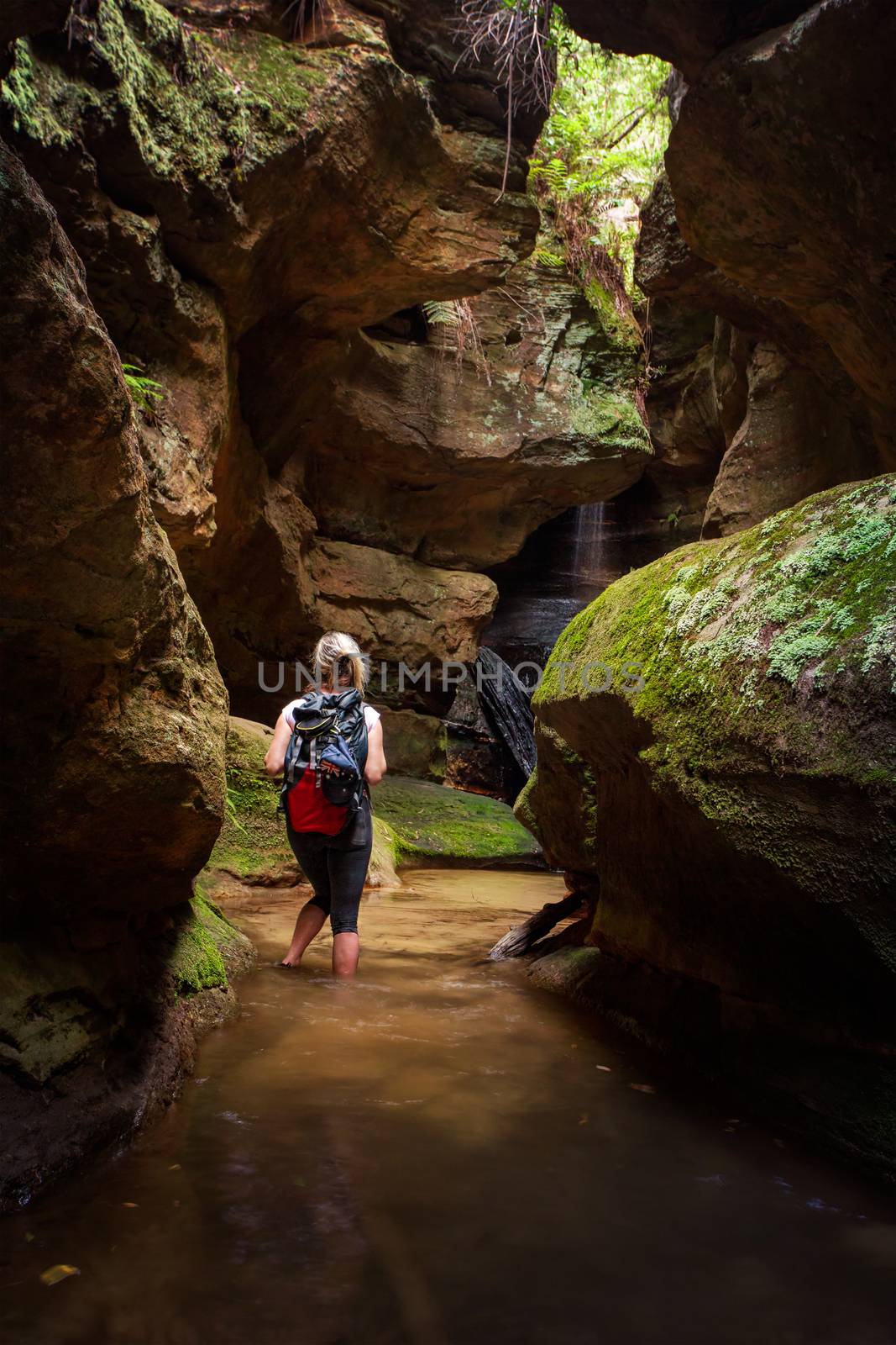 Tourist or female adventurer exploring a canyon in Blue Mountains by lovleah