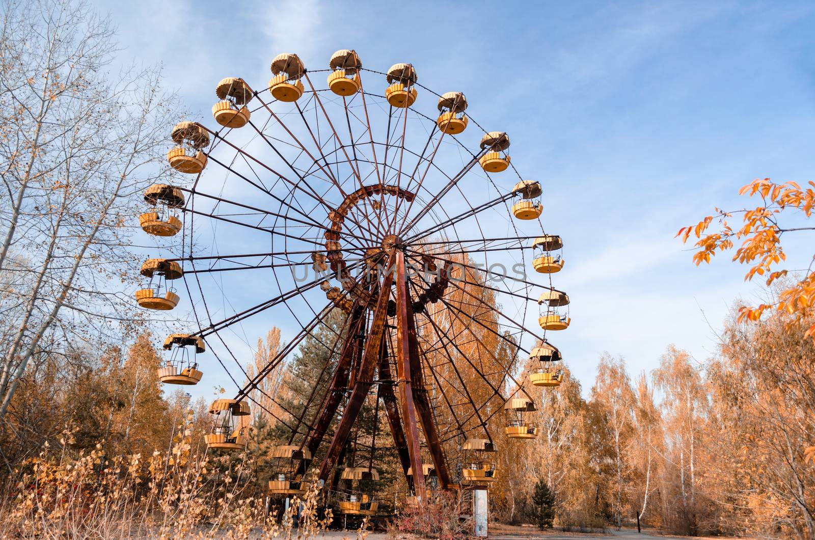 old carousel wheel in an abandoned amusement park in Chernobyl Ukraine in autumn
