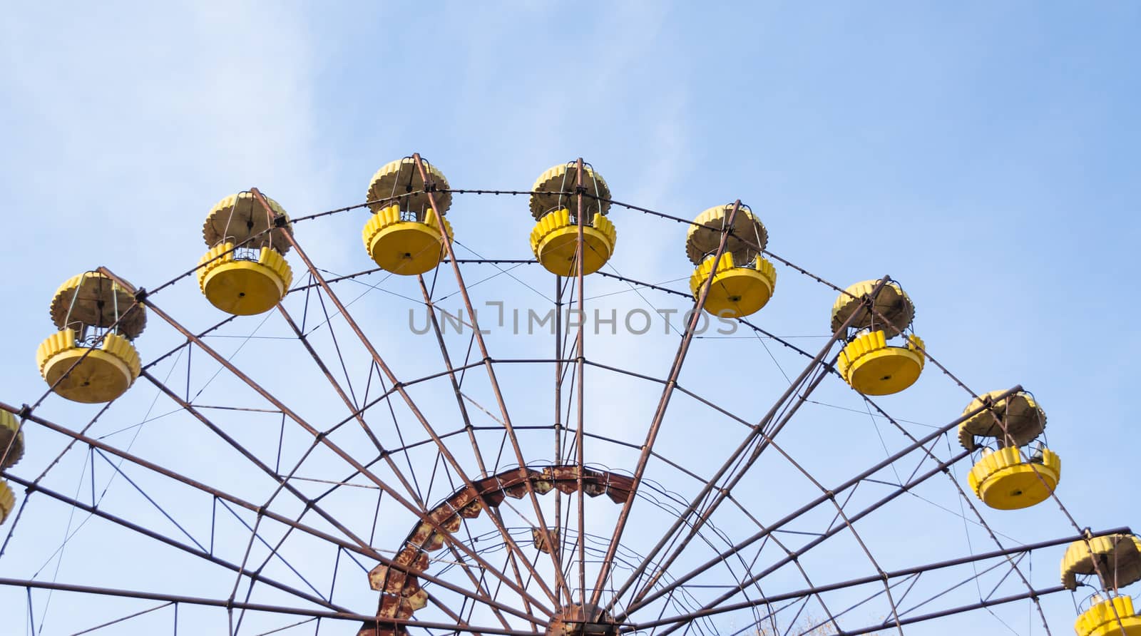 cabins old carousel wheel in an abandoned amusement park in Chernobyl Ukraine in autumn