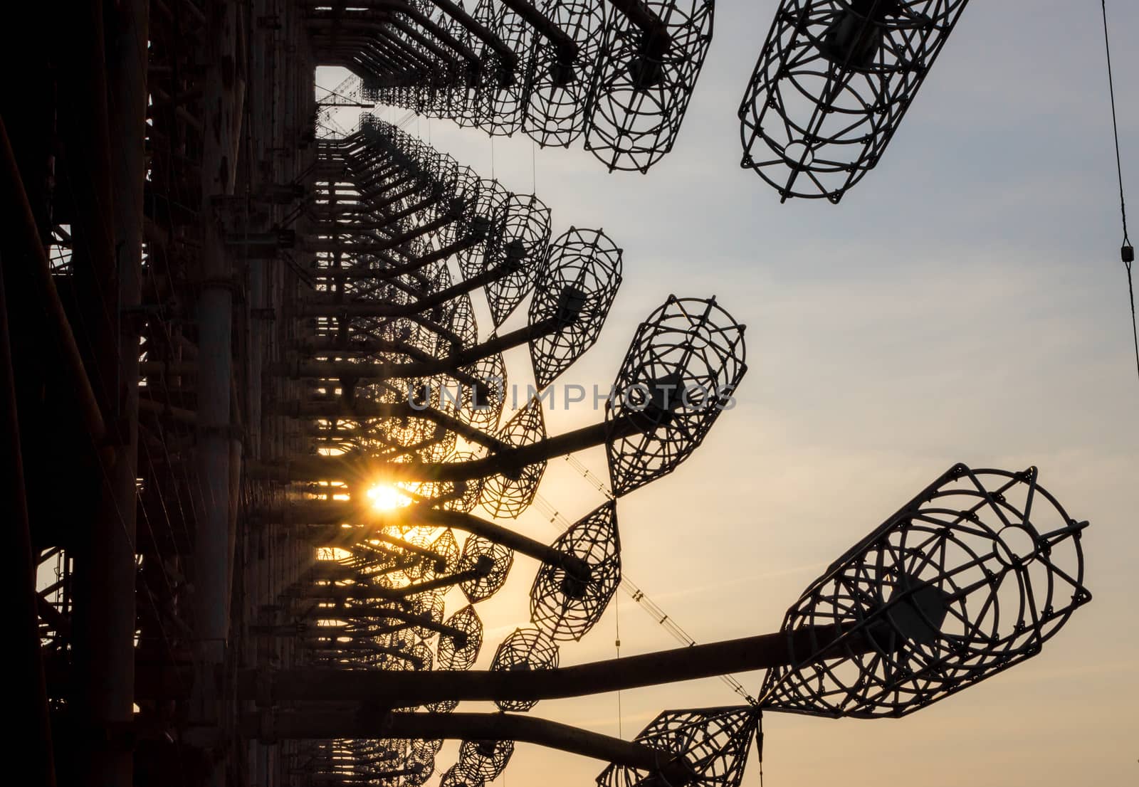secret army antenna locator in the forest at sunset with sun rays in Chernobyl Ukraine in autumn
