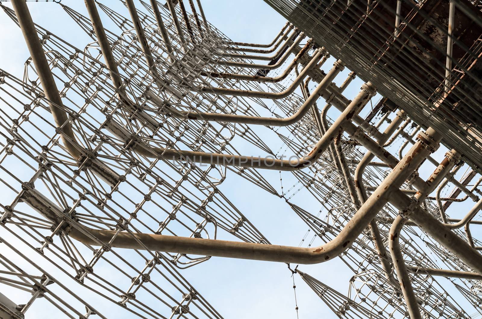 abstract pattern huge high army military radar against the blue sky in Chernobyl Ukraine
