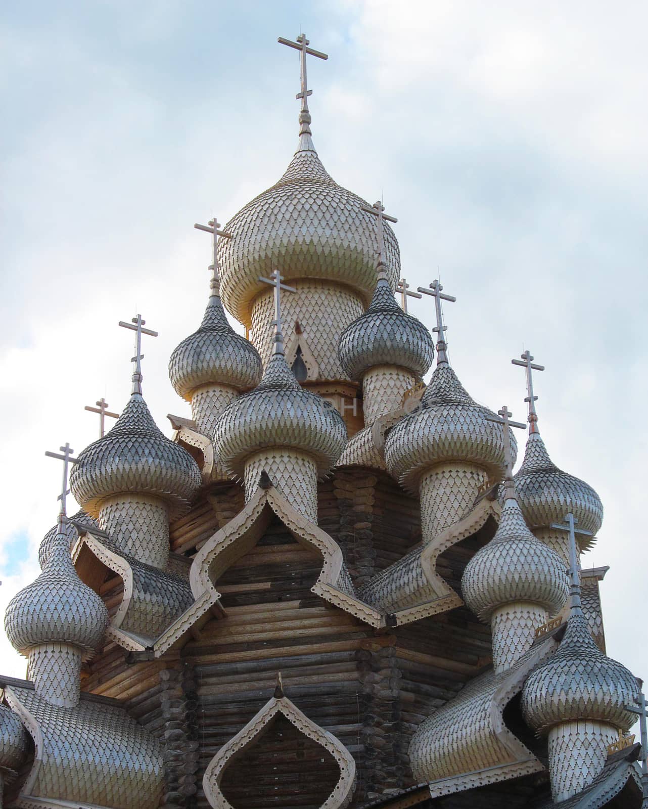 
Wooden domes of the ancient Church with crosses.