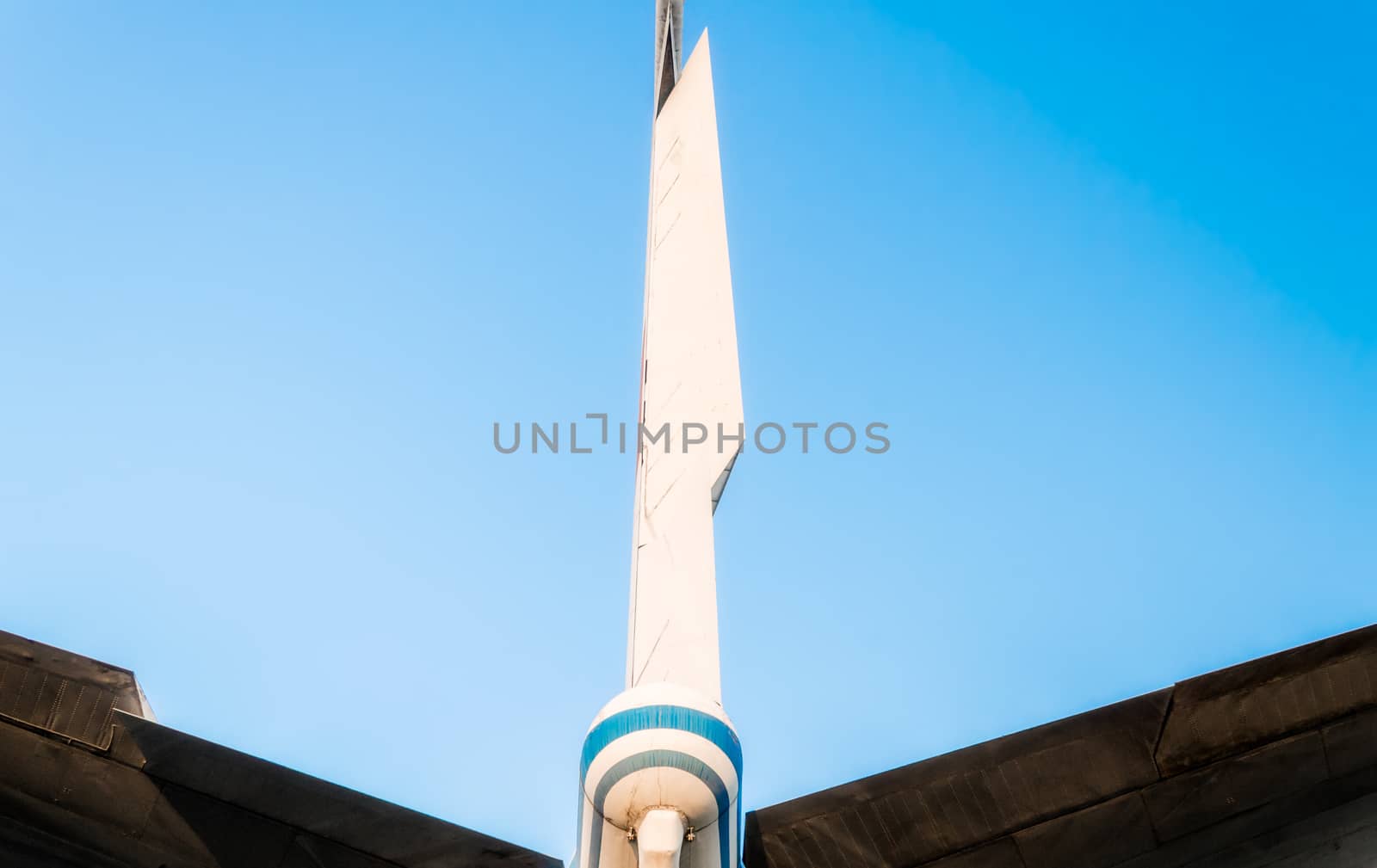 abstract background wings of a large airliner on a blue background isolated