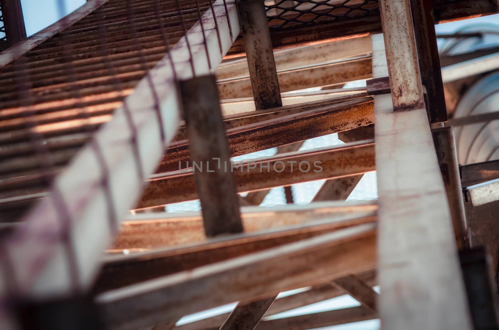 background of metal beams of industrial building closeup