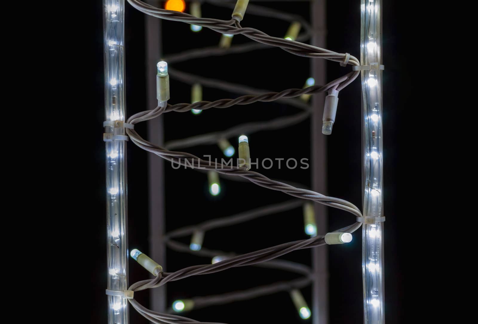 abstract background pattern small lamps on a black background closeup