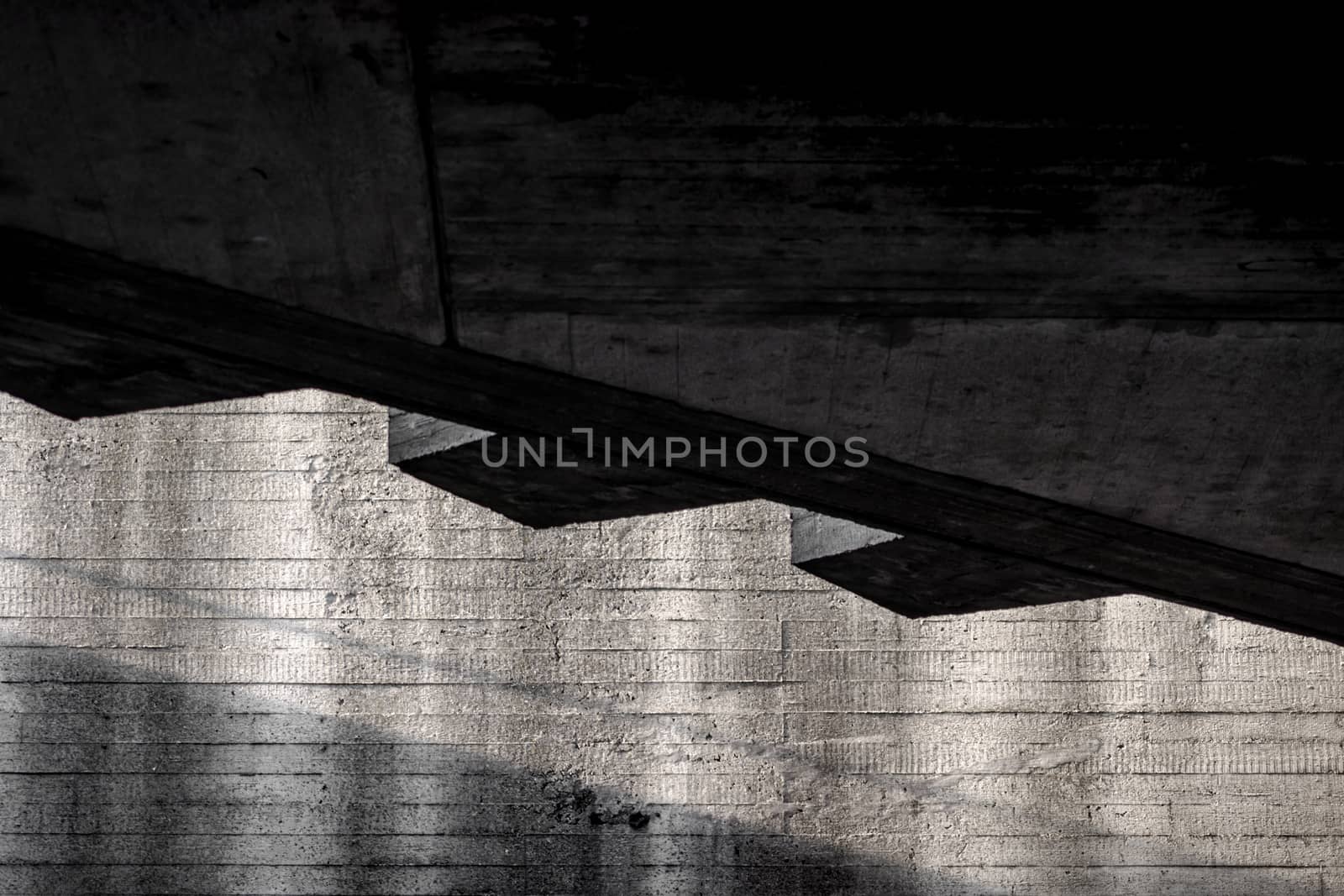 abstract background of gray concrete building wall structure with shadow