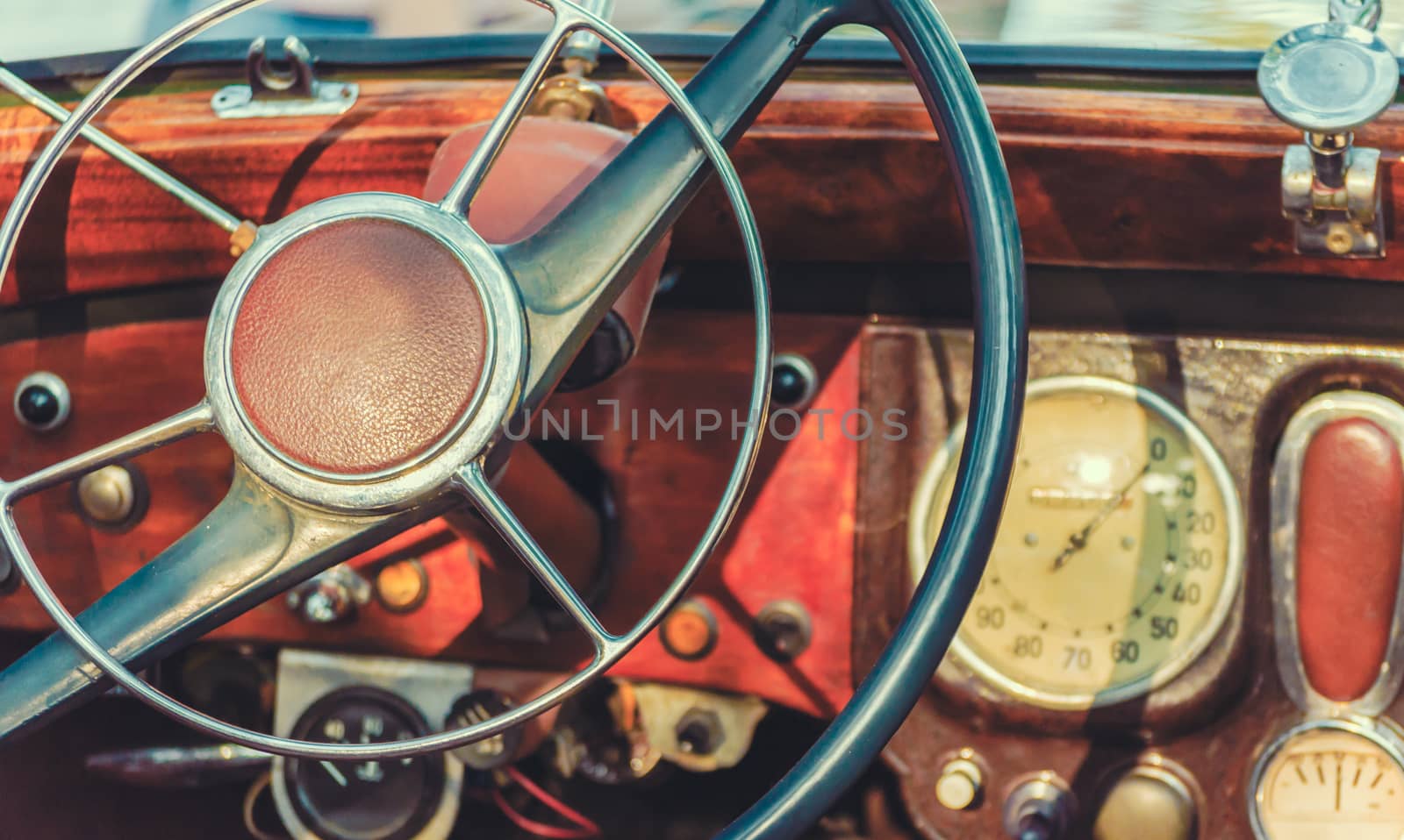 steering wheel and dashboard of an old retro car closeup