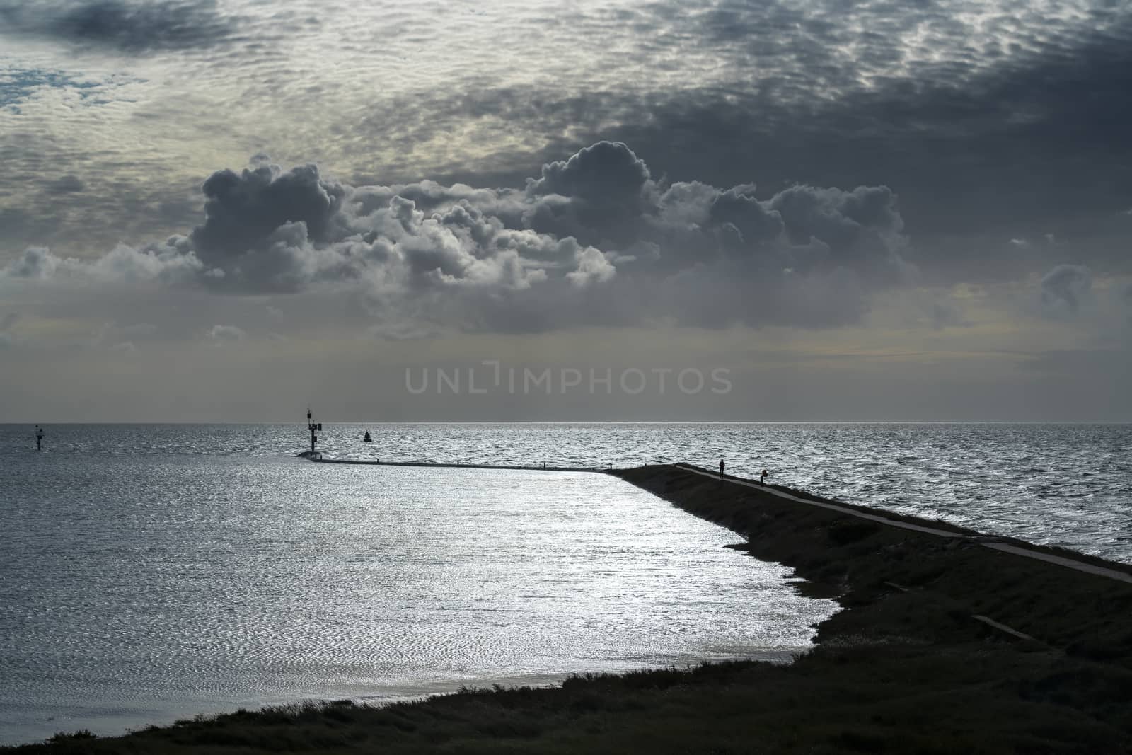 Imposing cloud formations above the pier of West Terschelling 
 by Tofotografie