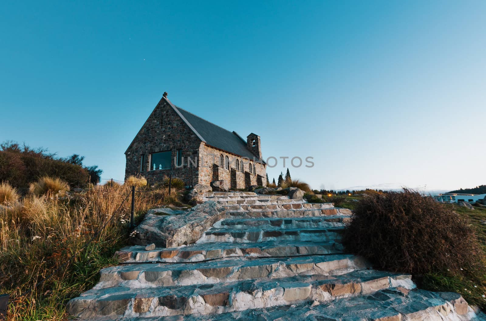 Historic Church Of the Good Shepherd on Lake Tekapo in New Zealand in late afternoon, just prior to sunset