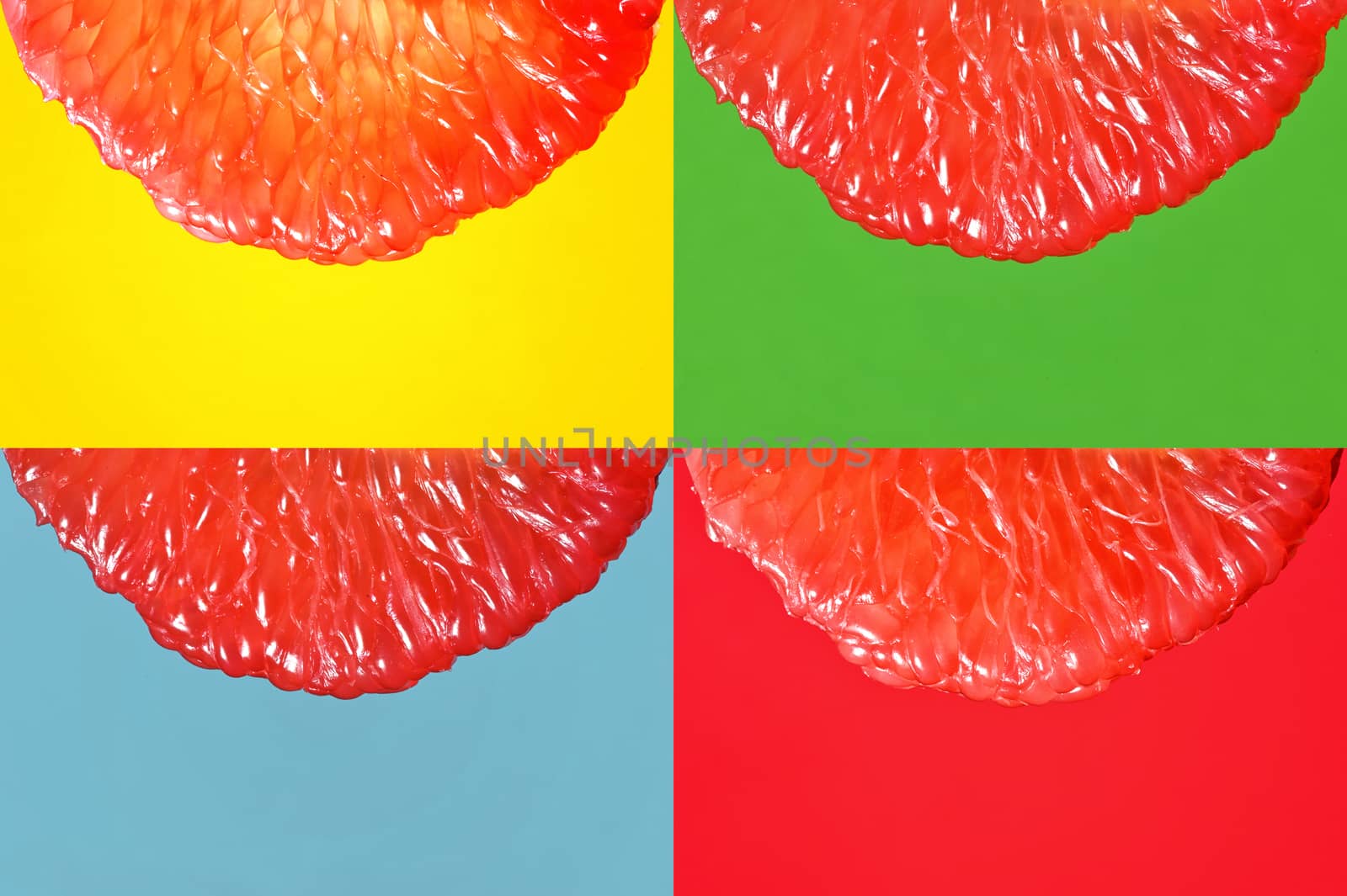 Peeled Slice Of Juicy Grapefruit on Yellow,Green, Blue and Red Background