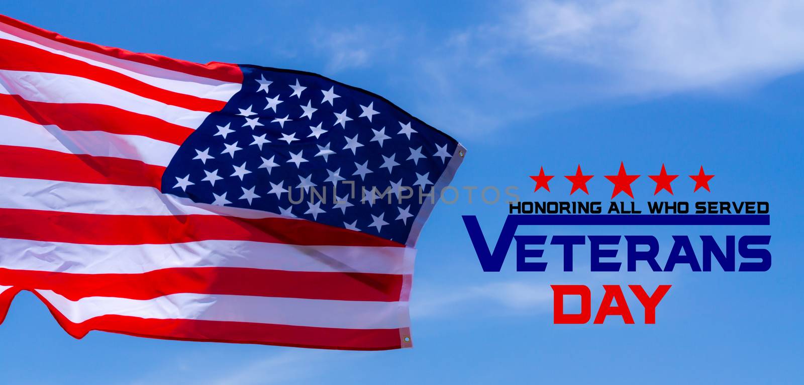 Happy Veterans Day with American flags on blue sky background. by mikesaran