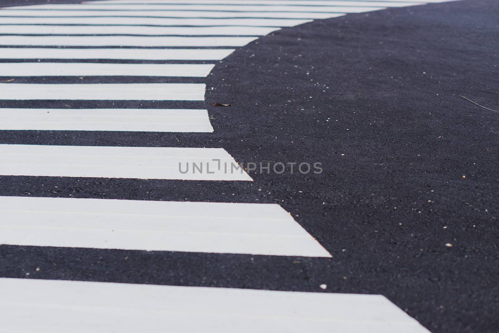 Zebra crossing track. Safety road crossing concept by mikesaran
