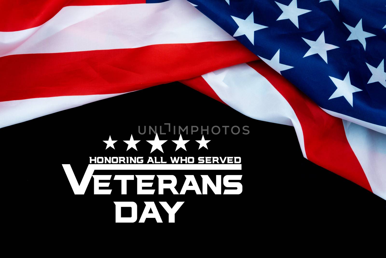 Happy Veterans Day with American flags on dark background. by mikesaran
