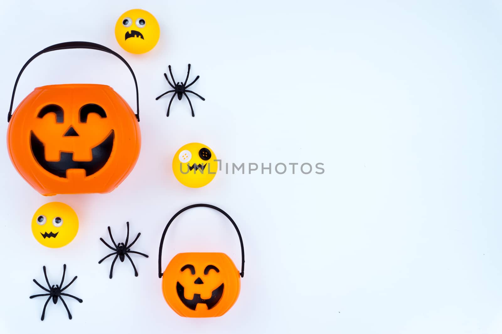 Top view of Halloween decoration, jack o lantern, ghost, bat and spider on white background with copy space for text. halloween concept.