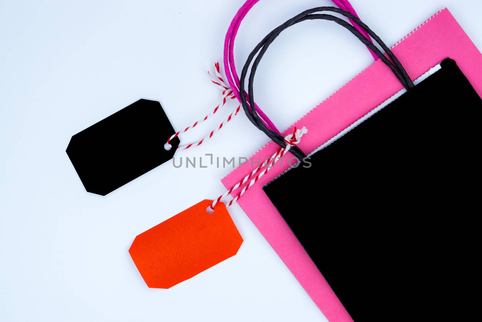 Online shopping of China, The shopping bag and tag sale on a white background with copy space for text. 11.11 single's day sale concept